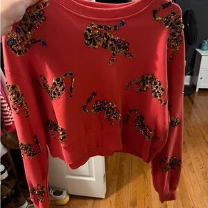 QUEEN OF SPARKLES Red Sweater with Leopard Sequin Accents